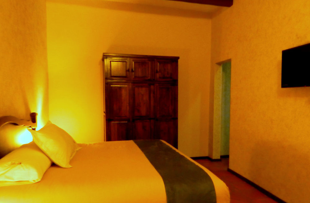Collection O Al Otro Lado Del Rio, Puebla Hotel Ngoại thất bức ảnh A room at the hotel