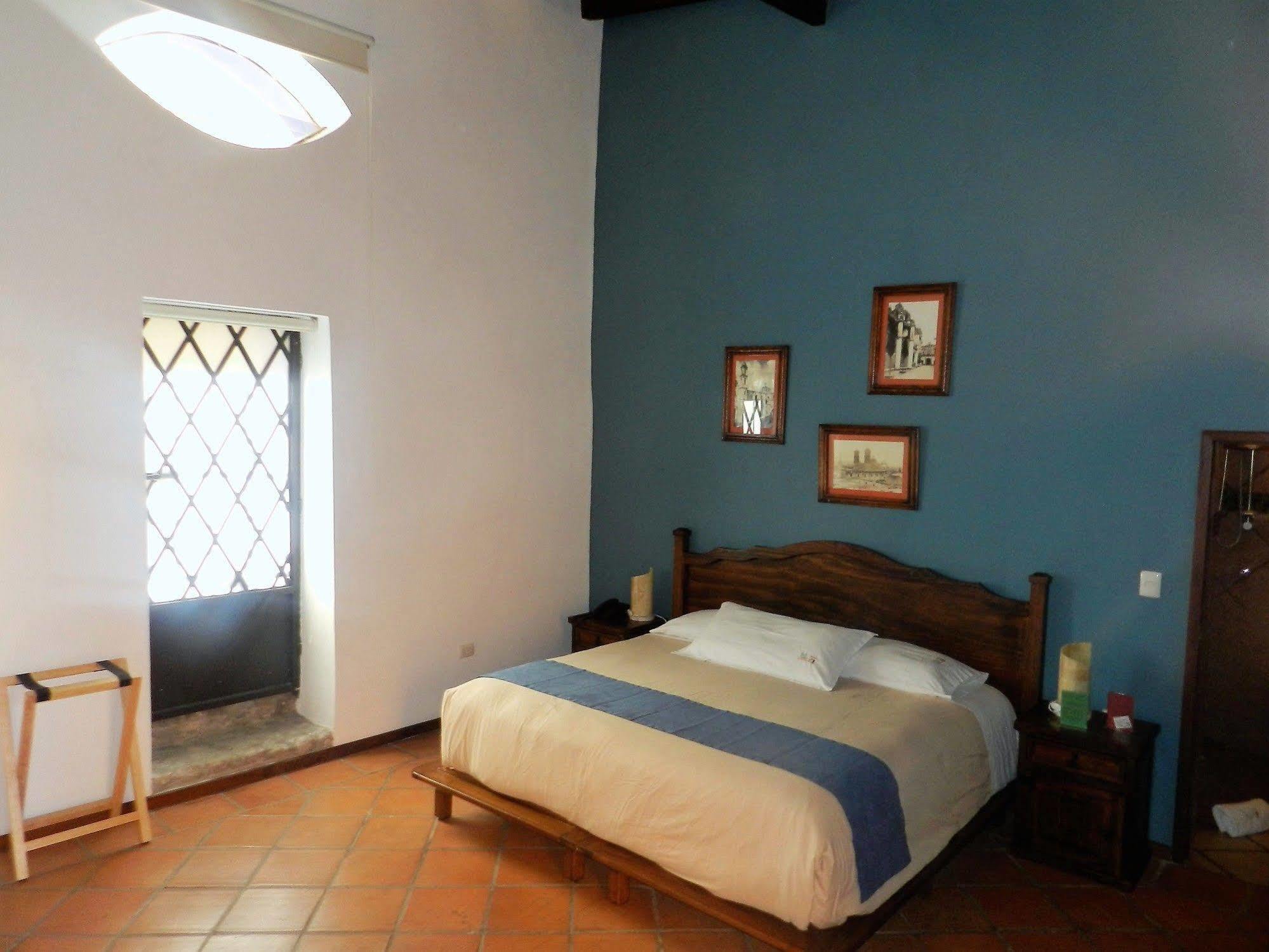 Collection O Al Otro Lado Del Rio, Puebla Hotel Ngoại thất bức ảnh A room at Hotel San Cristóbal