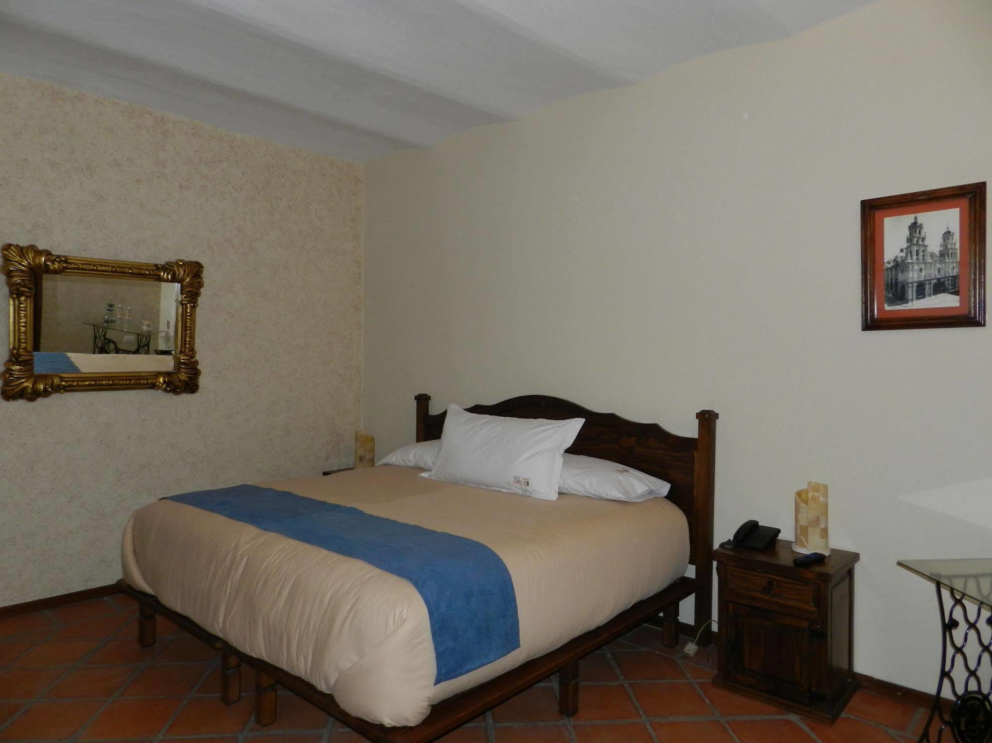 Collection O Al Otro Lado Del Rio, Puebla Hotel Ngoại thất bức ảnh A room at the hotel