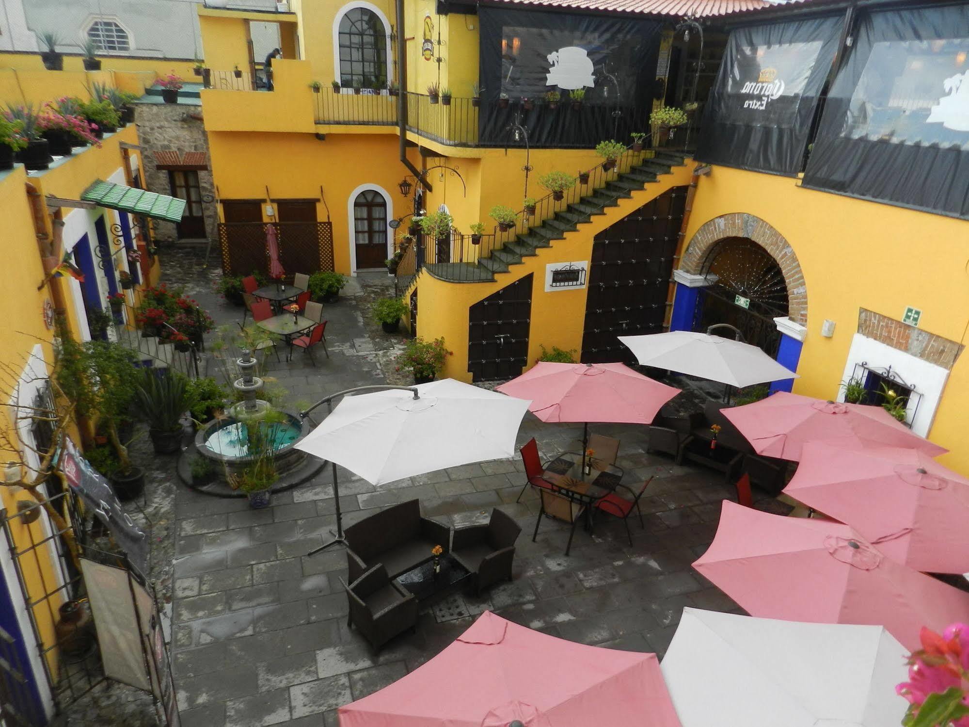 Collection O Al Otro Lado Del Rio, Puebla Hotel Ngoại thất bức ảnh Patio of the restaurant
